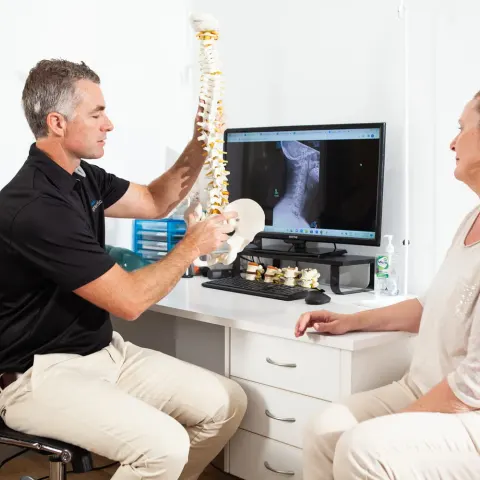 Spine model used in chiropractic consultation at Palm Beach Chiropractic Gold Coast