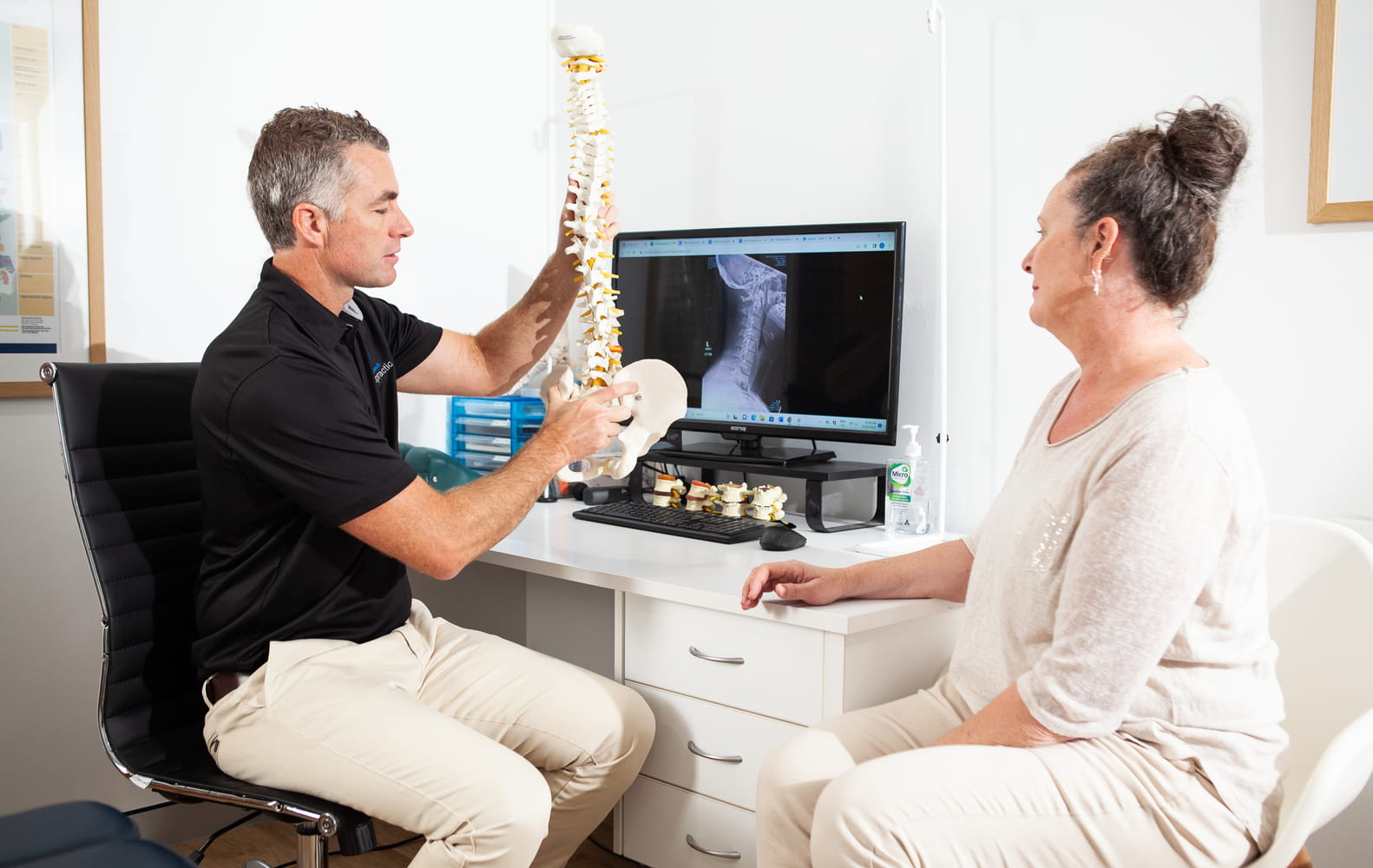 Spine model used in chiropractic consultation at Palm Beach Chiropractic Gold Coast