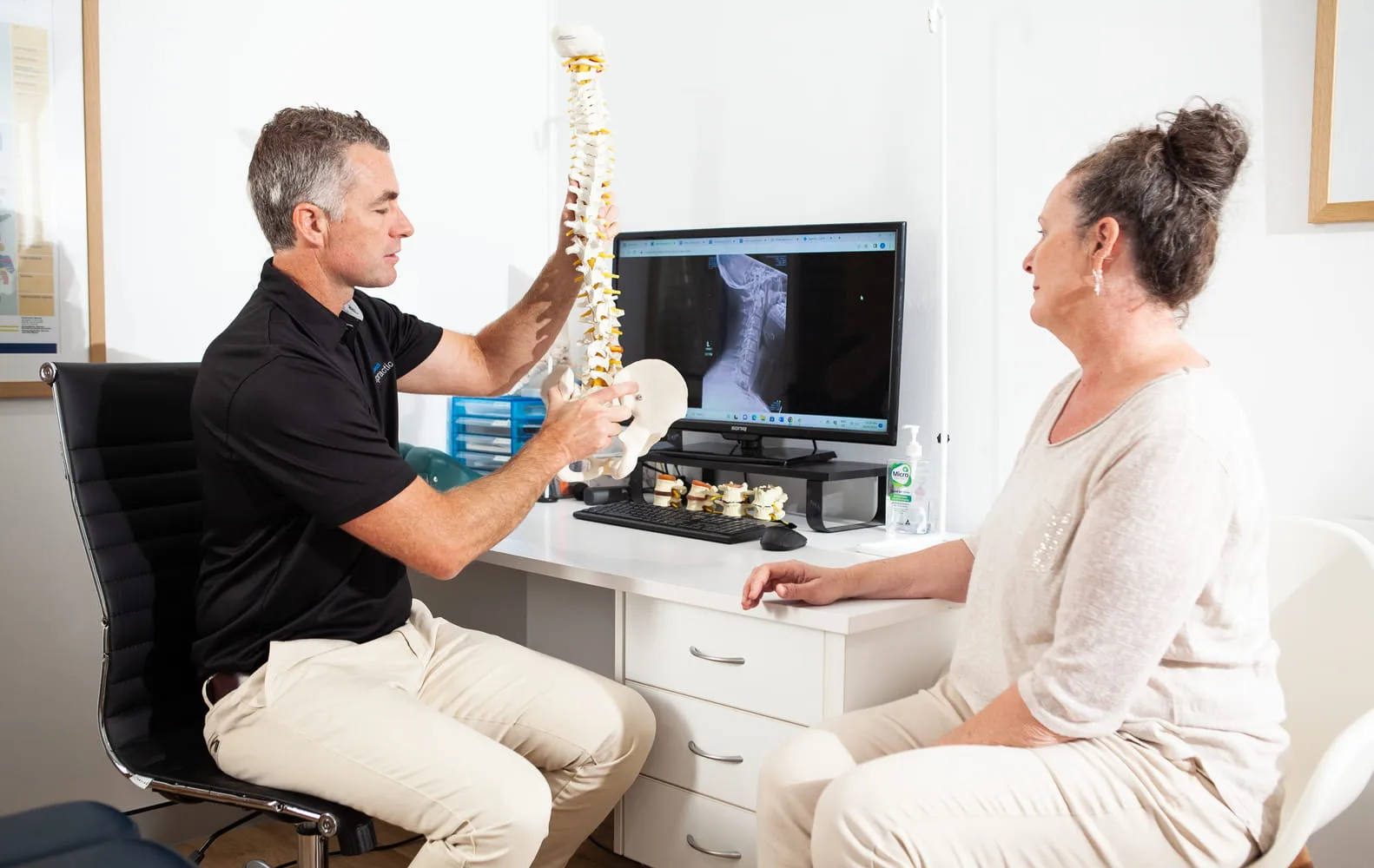 Spine model used in chiropractic consultation at Palm Beach Chiropractic Gold Coast